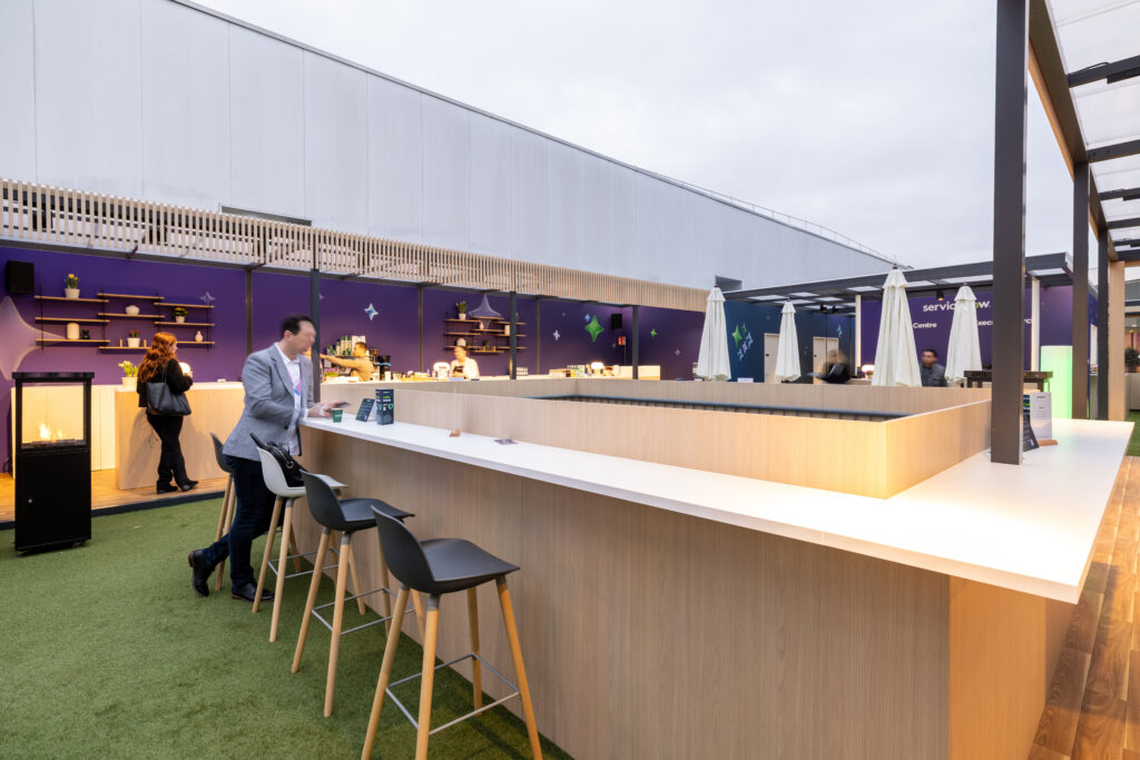 Neil Scrivener led ServiceNow's flagship host area in the Gardens at Fira Barcelona at Mobile World Congress 2026. 